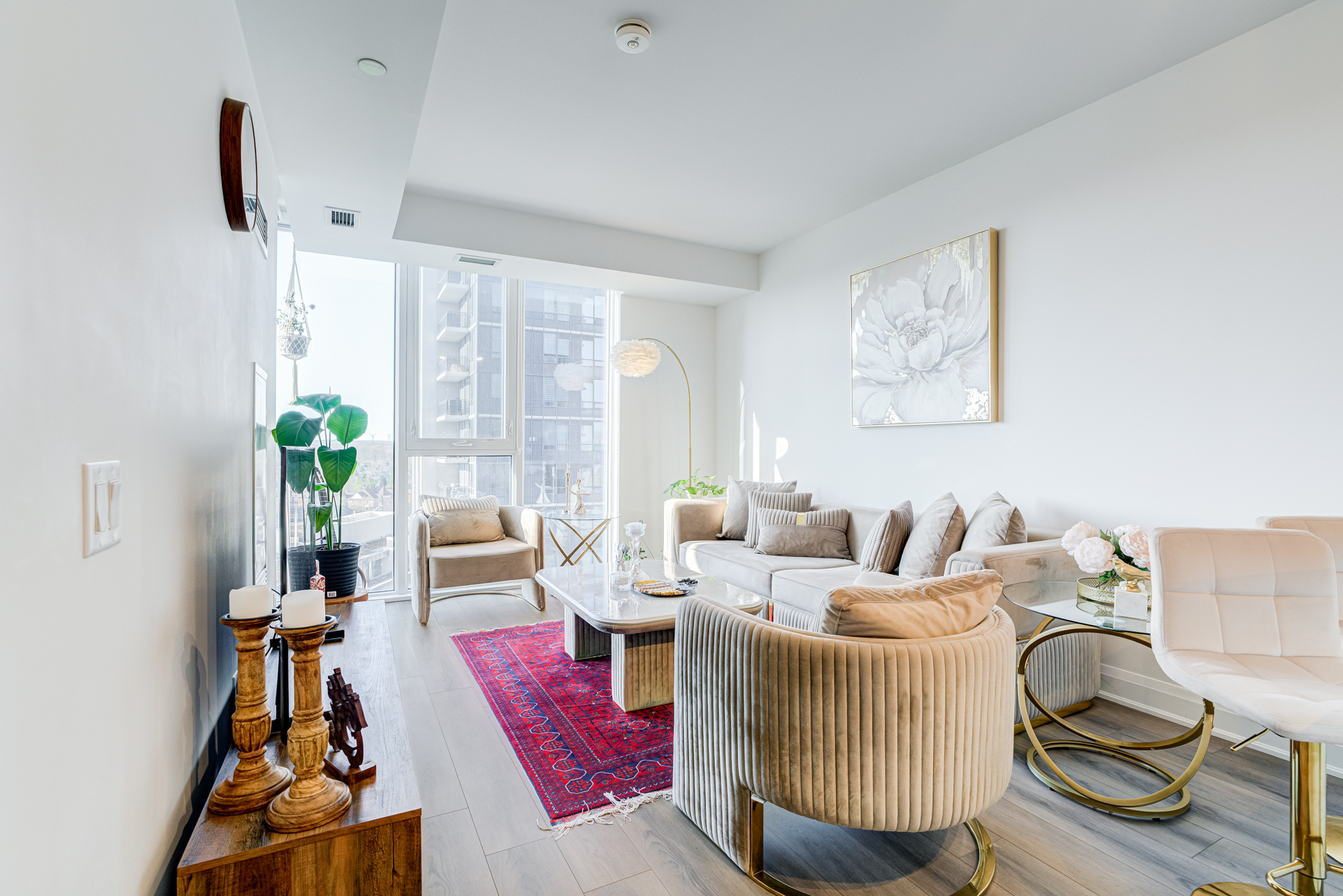 Sun-filled living room with skyline views