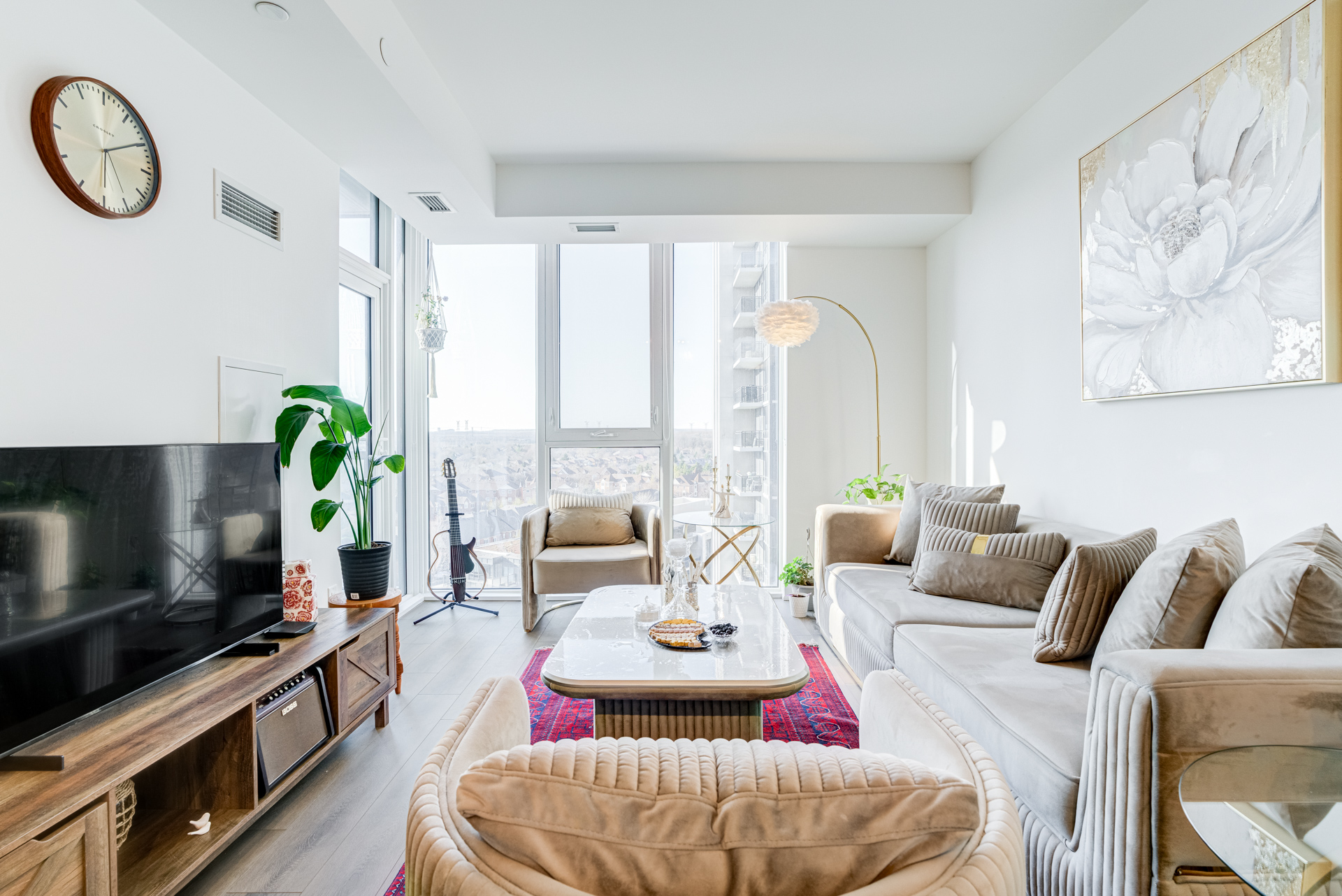 Living room with media wall and natural light
